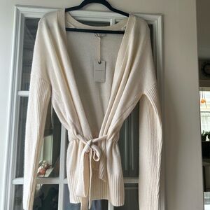 Beautiful brand new, with tags, never been worn Lucky Brand cream wrap sweater